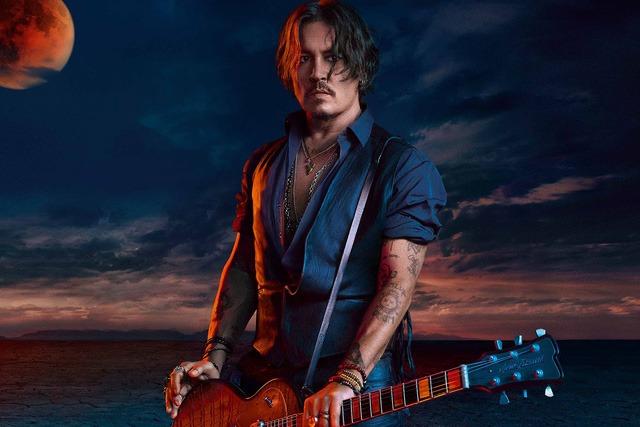 Johnny Depp kín tiếng hơn hậu thắng kiện